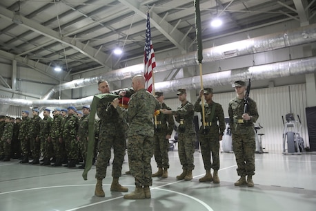Sgt. Maj. Paul Costa, left, sergeant major of 3rd Battalion, 8th Marines, cases the colors alongside Lt. Col. Kemper Jones, right, commanding officer of 3rd Battalion, 8th Marines during the transfer of authority ceremony aboard Mihail Kognalniceanu Air Base, Romania, Jan. 22, 2016. The rotational force of Marines and sailors gives U.S. European Command the continuous capability to integrate with NATO and partner nations in Eastern Europe. (U.S. Marine Corps photo by Cpl. Immanuel M. Johnson/Released)