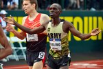 Army Spc. Paul Chelimo finishes the 5,000 meter final in third place during the 2016 U.S. Olympic Track and Field Trials at Hayward Field in Eugene, Ore., July 9, 2016. Army photo by Tim Hipps