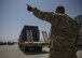Staff Sgt. Jacob Chavez, 455th Expeditionary Logistics Readiness Squadron Central Command material recovery element, guides a delivery truck, July 14, 2016, Bagram Airfield, Afghanistan. The CMRE team accounts for and redeploys war reserve assets. (U.S. Air Force photo by Senior Airman Justyn M. Freeman)