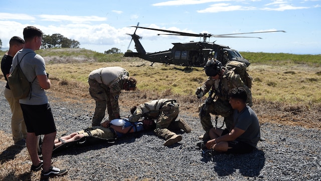 Special Tactics Airmen from the 320th Special Tactics Squadron prepare to load simulated injured civilians on the UH-60 Blackhawk during a humanitarian assistance and disaster response scenario as part of Rim of the Pacific 2016, at Pohakuloa Training Area, Hawaii, July 10, 2016. Twenty-six nations, more than 40 ships and submarines, more than 200 aircraft and 25,000 personnel are participating in RIMPAC from June 30 to Aug. 4, in and around the Hawaiian Islands and Southern California. The world's largest international maritime exercise, RIMPAC provides a unique training opportunity that helps participants foster and sustain the cooperative relationships that are critical to ensuring the safety of sea lanes and security on the world's oceans. RIMPAC 2016 is the 25th exercise in the series that began in 1971.