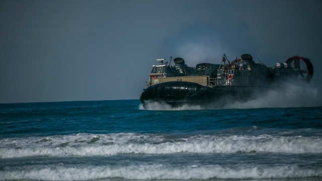 Marines with 4th Tank Battalion, 4th Marine Division, Marine Forces Reserve, perform a beach landing on a landing craft air cushion during their annual training aboard Marine Corps Base Camp Pendleton, California, July 16, 2016. Annual training exercises ensure that Reserve Marines are trained and prepared for any future operation or contingency. 