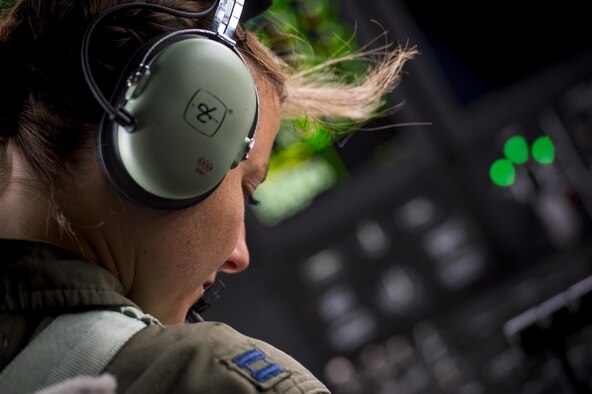U.S. Air Force Capt. Christy Wise, 71st Rescue Squadron HC-130 J Combat King II pilot, looks over flight plans prior to her first flight since becoming an above-the-knee amputee, July 22, 2016, at Moody Air Force Base, Ga. Wise says her goal from day one after the accident was to return to the cockpit. (U.S. Air Force Photo by Senior Airman Ryan Callaghan)
