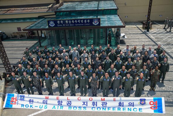 Senior leaders from the Combined Forces Command gather for a group photo for the 2016 CFC Air Boss Conference July 22, 2016, at Osan Air Base, Republic of Korea. Eighty-one senior leaders, including 24 general officers from all branches of the Republic of Korea, United States and alliance forces, discussed airpower strategies in the Pacific region during the conference. (U.S. Air Force photo by Senior Airman Dillian Bamman/Released)