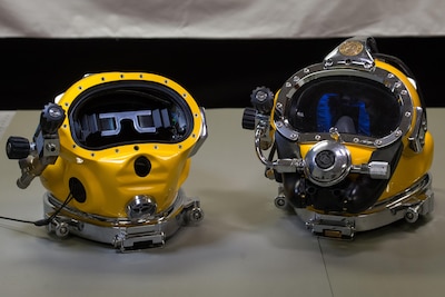 A prototype dive helmet with the Diver Augmented Vision Display, left, provides a comparison view to an unmodified dive helmet at the Naval Surface Warfare Center Panama City Division at the Naval Support Activity Panama City in Panama City, Fla., July 15, 2016. DoD photo by EJ Hersom