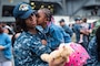 Navy Petty Officer 1st Class Donisha Brown reunites with her daughter during a homecoming celebration for the USS Ronald Reagan at Fleet Activities Yokosuka, Japan, July 26, 2016.The aircraft carrier participated in 53 days of strike group operations. Navy photo by Petty Officer 3rd Class James Lee