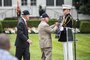 Navy Secretary Ray Mabus, left, looks on as retired Marine Corps Col. Harvey Barnum, Vietnam War Medal of Honor recipient, signs a poster of the USS Harvey C. Barnum Jr., the Navy ship named after him, during a ceremony at Marine Barracks Washington, D.C., July 28, 2016.  DoD photo by U.S. Army Sgt. James K. McCann