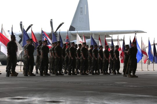 Marines with Marine Aerial Refueler Squadron (VMGR)152 stand in formation during a change of command ceremony at Marine Corps Air Station Iwakuni, Japan, May 27, 2016. Lt. Col. Matthew W. Stover, commanding officer of VMGR-152, passed his responsibillities on to Lt. Col. Andrew J. Pushart, Marine Aircraft Group (MAG) 12 special projects officer, after serving as the squadron commander for two years. (U.S. Marine Corps photo by Cpl. Nicole Zurbrugg/Released)