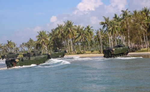 TANDUO BEACH, MALAYSIA (May 30, 2016) – U.S. Marines assigned to Easy Company, Battalion Landing Team, 2nd Battalion, 2nd Marines conduct an amphibious transition from ship to shore. The Marines are embarked aboard the USS Ashland (LSD 48) in support of exercise Cooperation Afloat Readiness and Training. CARAT is a series of annual, bilateral maritime exercises between the U.S. Navy, U.S. Marine Corps and the armed forces of nine partner nations to include Bangladesh, Brunei, Cambodia, Indonesia, Malaysia, Singapore, the Philippines, Thailand and Timor-Leste.The Ashland is assigned to U.S. 7th Fleet. (U.S. Navy photo by Lance Cpl. Carl King Jr/. Released)