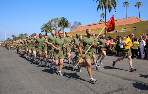 Marines of Fox Company, 2nd Recruit Training Battalion, run in formation during their motivation run at Marine Corps Recruit Depot San Diego, June 2. The run signifies the last training event on the training schedule. Annually, more than 17,000 males recruited from the Western Recruiting Region are trained at MCRD San Diego. Fox Company is scheduled to graduate June 3.