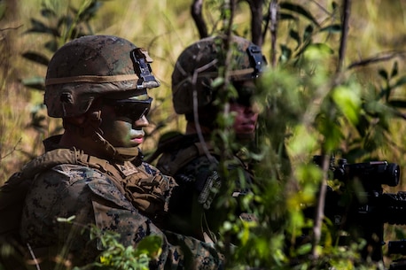 U.S. Marine Corps Lance Cpl. Miguel Santibanez, automatic rifleman, sits in the defensive position during Exercise Southern Jackaroo at Shoalwater Bay, Queensland, Australia, May 18, 2016. Conducting defensive training allows U.S. Marines and Australian service members to share techniques, tactics and procedures to improve their defensive skills during Marine Rotational Force – Darwin (MRF-D). MRF-D is a six-month deployment of Marines into Darwin, Australia, where they will conduct exercises and train with the Australian Defence Forces, strengthening the U.S.-Australia alliance.