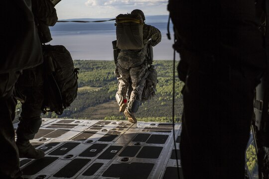 A U.S. Army soldier jumps from the cargo bay of a  Marine Aerial Refueler Transport Squadron 152 KC-130J Super Hercules during exercise Kodiak Mace at Joint Base Elmendorf-Richardson, Alaska, May 25, 2016. The squadron traveled from Marine Corps Air Station Iwakuni, Japan to train with the 4th Infantry Brigade Combat Team, 25th Infantry Division in Alaska to support the exercise. Kodiak Mace is an annual joint exercise designed to give the U.S. Marines and the U.S. Army training time to enhance cohesion and mission readiness. (U.S. Marine Corps photo by Cpl. Cory Schubert/Released)