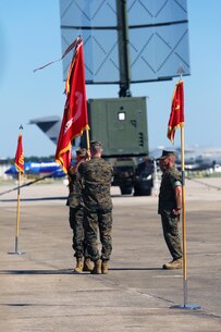 Maj. Gen. Gary L. Thomas passes the 2nd Marine Aircraft Wing colors to Brig. Gen. Matthew G. Glavy during the 2nd MAW change of command ceremony at Marine Corps Air Station Cherry Point, N.C., June 9, 2016. Thomas relinquished his post as 2nd MAW commanding general to Glavy during the ceremony. (U.S. Marine Corps photo by Lance Cpl. Mackenzie Gibson/Released)