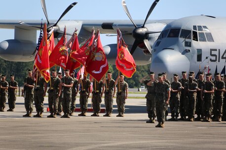 2nd Marine Aircraft Wing Marines salute the colors while the National Anthem is played during the 2nd MAW change of command ceremony at Marine Corps Air Station Cherry Point, N.C., June 9, 2016. Maj. Gen. Gary L. Thomas relinquished his post as the 2nd MAW commanding general to Brig. Gen. Matthew G. Glavy during the ceremony. (U.S. Marine Corps photo by Cpl. N. W. Huertas/Released)