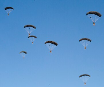 U.S. Marines with the Maritime Raid Force, 26th Marine Expeditionary Unit (MEU), sails toward the ground in Kuwait while participating in a High Altitude, High Opening (HAHO) parachute training exercise, Feb. 25, 2016. The Marines performed the HAHO jump at an altitude of approximately 10,000 feet utilizing an MV-22 Osprey. The 26th MEU is embarked with the Kearsarge Amphibious Ready Group (KSGARG) while deployed in support of maritime security operations in the 5th Fleet area of operations. (U.S. Marine Corps photo by Sgt. Austin Long/ Released)