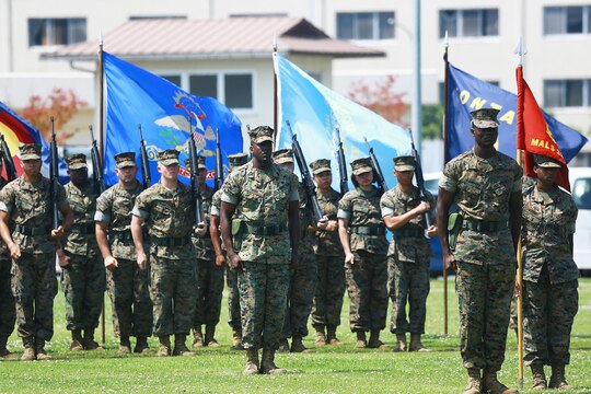U.S. Marines with Marine Aviation Logistics Squadron 12 perform drill movements during Lt. Col. Kolter R. Miller’s, outgoing MALS-12 commanding officer, change of command ceremony at Marine Corps Air Station Iwakuni, Japan, June 10, 2016. After serving three years as the squadron’s executive officer, Lt. Col. John A. Fallon assumed leadership as Miller continues his military career at the Dwight D. Eisenhower School for National Security and Resource Strategy. (U.S. Marine Corps photo by Cpl. Justin Fisher/Released)