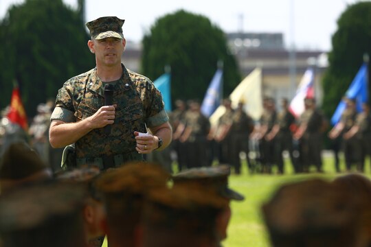 U.S. Marine Corps Lt. Col. John A. Fallon, incoming Marine Aviation Logistics Squadron 12 commanding officer, addresses the audience during a change of command ceremony at Marine Corps Air Station Iwakuni, Japan, June 10, 2016. Fallon assumed command from Lt. Col. Kolter R. Miller, outgoing MALS-12 commanding officer, after serving as the executive officer for three years. (U.S. Marine Corps photo by Cpl. Justin Fisher/Released)