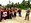 Battalion Commander Lt. Col. Carlos T. Jackson, right, addresses Texas A&M Corps of Cadets visitors on the Amphibious Assault Vehicle capability provided by Combat Assault Battalion in support of the 3rd Marine Division, May 18, 2016, at Camp Schwab, Okinawa, Japan. The Cadets visited Okinawa as part of a scholarship program which provides students the opportunity to tour military installations to learn about different occupational specialties and duty stations. This is the first time Texas A&M Corps of Cadets visited Okinawa.
