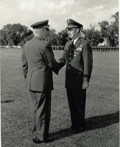 GEN Harold K. Johnson, Chief of Staff, US Army, congratulates Lt. Gen. Alva Fitch, Deputy Director, DIA, after presenting him the Distinguished Service Medal during a retirement ceremony held in his honor.  31 May 1966, Ft. Myer, VA.
