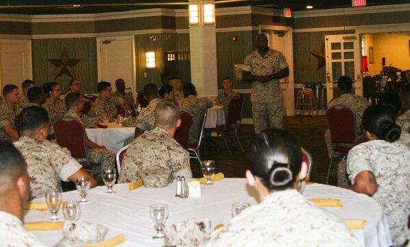 Sgt. Maj. Gerald Saunders, MCINCR-MCB Quantico sergeant major, addresses enlisted Marines at a monthly Troop Appreciation gathering and Professional Military Education session at The Clubs of Quantico June 1.