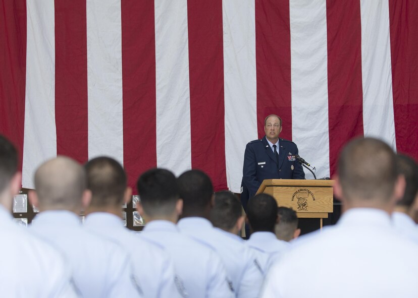 Col. Sean Robertson, 374th Maintenance Group incoming commander, gives a speech during a change of command ceremony at Yokota Air Base, Japan, June 20, 2016. Robertson served as the deputy commander of the 374 MXG for three years prior to his current position. (U.S. Air Force photo by Yasuo Osakabe/Released)