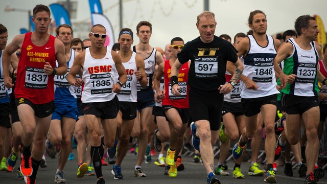 Runners begin their race at the Torbay Half Marathon at Torbay, England, June 26, 2016. Leading the pack are the Royal Naval team and the All-Marine running team, both teams finished with times ranging from 1:13 to 1:30. 