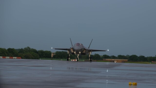 A Marine guides an F-35B Lightning II at Royal Air Force Base Fairford in the United Kingdom after the first F-35 trans-Atlantic flight, June 29, 2016. Three F-35B’s flew from Marine Corps Air Station Beaufort, South Carolina and landed at RAF Fairford in Gloucester, England. They were assisted by two KC-10’s and refueled 15 times over the Atlantic Ocean. 