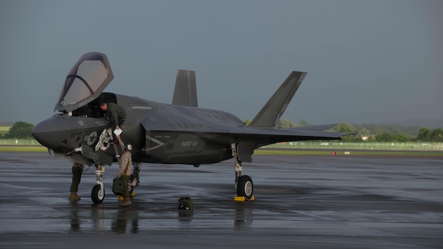 Maj. Jack Cronan, an F-35B pilot with Marine Operational Test and Evaluation Squadron One, prepares to dismount from his aircraft after the first F-35 trans-Atlantic flight, at Royal Air Force Base Fairford in the United Kingdom, June 29, 2016. Three F-35B’s flew from Marine Corps Air Station Beaufort, South Carolina and landed at RAF Fairford in Gloucester, England. They were assisted by two KC-10’s and refueled 15 times over the Atlantic Ocean.