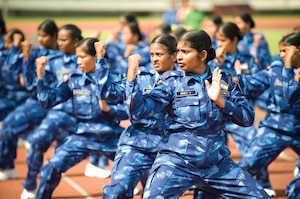 Members of the all-female Indian Formed Police Unit of the United Nations Mission in Liberia (UNMIL) perform a martial arts exercise prior to receiving medals of honor in recognition of their service.