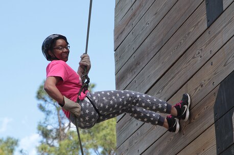 Misty Haney conquers a fifty-foot rappel tower March 3, 2016, aboard Marine Corps Recruit Depot Parris Island, S.C. The teachers, coaches, and principals of Recruiting Stations Atlanta and Columbia participate in a three-day workshop designed to inform educators about military service and life in the Marine Corps. Haney is a teacher at Lake Ridge High School in Atlanta, Ga. (Official Marine Corps photo by Cpl. Diamond N. Peden/Released)