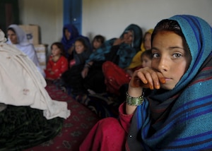 An Afghan girl attends a female engagement team meeting in Balish Kalay Village, Urgun District, Afghanistan (March 2011).