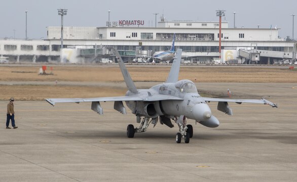 An FA-18A++ Hornet with Marine Fighter Attack Squadron (VMFA) 314, forward deployed to Marine Corps Air Station Iwakuni, Japan, arrives at Komatsu Air Base, Japan, for the Komatsu Aviation Training Relocation exercise March 7, 2016. VMFA-314, also known as the “Black Knights,” took the lead in conducting dissimilar air combat training and bilateral tactical mission training with the Japan Air Self-Defense Force. Every ATR contributes to U.S. and Japan forces’ understanding of each other’s capabilities and methods by fostering peace and stability through increased interoperability. (U.S. Marine Corps photo by Cpl. Nicole Zurbrugg/Released)