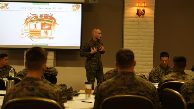 U.S. Marine Sgt. Maj. Troy E. Black speaks to lieutenants at the 1st Marine Logistics Group lieutenant seminar aboard Camp Pendleton, Calif., Feb. 25, 2016. Black is the sergeant major of 1st MLG. This seminar among first and second lieutenants in the Group was designed to garner knowledge and foster the camaraderie within the ranks, forming confident and decisive leaders. The seminar had two sessions in February and will continue at least bi-annually. (U.S. Marine Corps photo by 1st Lt. Allison Burgos/Released)