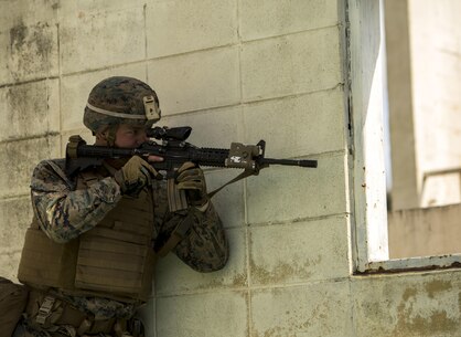 Cpl. Colton Warembourg, 20, a Brighton Colorado native, clears a building during a training exercise with the Rebulic of Korea Marines, March 9, 2016, Pohang, Korea, as part of exercise Ssang Yong 2016. Ssang Yong 16 is a biennial combined amphibious exercise conducted by forward-deployed U.S. forces with the ROK Navy and Marine Corps, Australian Army and Royal New Zealand Army Forces in order to strengthen our interoperability and working relationships across a wide range of military operations - from disaster relief to complex expeditionary operations. Warembourg is part of Weapons Company, 1st battalion, 3rd Marine Regiment (The Lava Dogs). Warembourg graduated from Prairie View high school and was recruited out of Recruiting Sub Station Metro North.