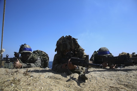 A New Zealand Soldier and Republic of Korea  Marines rehearse an amphibious assault, on Doksukri Beach, Republic of Korea, March 11, 2016, for exercise Ssang Yong 16. Ssang Yong is a biennial military exercise focused on strengthening the amphibious landing capabilities of the ROK, the U.S., New Zealand and Australia. (U.S. Marine Corps photo by Cpl. Allison Lotz/Released)