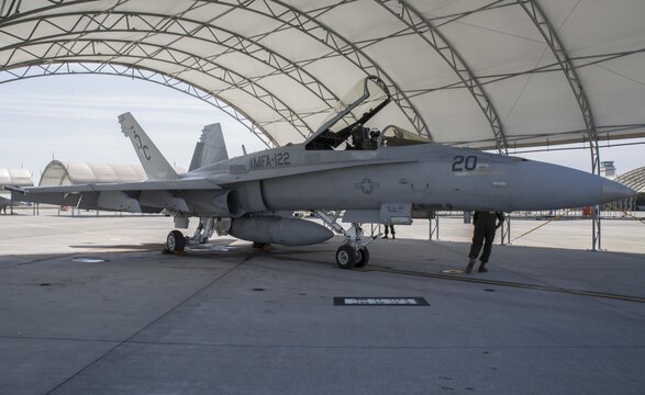 An F/A-18C Hornet with Marine Fighter Attack Squadron (VMFA) 122, sits on the flightline at Marine Corp Air Station Iwakuni, Japan, March 22, 2016. VMFA-122, also known as the “Werewolves,” arrived in Iwakuni March 14 from MCAS Beaufort, S. C. for a six month rotation with the unit deployment program. The Werewolves’ overall mission is to destroy surface targets and enemy aircraft day or night under all weather conditions during expeditionary, joint and combined operations.(U.S. Marine Corps photo by Cpl. Nicole Zurbrugg/Released) 