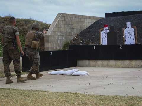 MARINE CORPS BASE HAWAII — Cpl. Zachary Summers, a radio operator with 3rd Radio Battalion, combat glides toward a target shooting his M9 Service Pistol during a Pacific Combat Shooting Match at the Kaneohe Bay Range Training Facility aboard Marine Corps Base Hawaii, March 16, 2016. Teams from different units used various weapons and tactics to achieve the fastest time possible on different courses of fire, while earning points for awards during the competition. Marines from the Marine Corps Combat Shooting Team instructed and gave advice to the Marines participating in the event. (U.S. Marine Corps Photo by Lance Cpl. Jesus Sepulveda Torres)