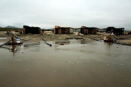 Marines with Utilities Platoon, Headquarters and Support Company, 7th Engineer Support Battalion, 1st Marine Logistics Group, operate four tactical water purification systems during a utilities exercise at Red Beach aboard Camp Pendleton, Calif., March 21, 2016. Utilities Platoon conducted an eight-day field exercise which focused on their ability to provide clean water and stable power to a unit located in an environment without standard utility resources. (U.S. Marine Corps photo by Cpl. Carson Gramley/released)