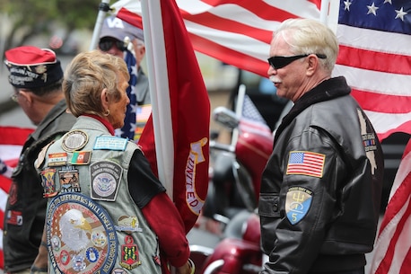 MARINE CORPS BASE CAMP PENDLETON, Calif. – Peggy Kane speaks with another Patriot Guard Rider before the start of the 3rd Battalion, 5th Marine Regiment “Dark Horse” Reunion at the San Mateo Memorial Garden April 29, 2016. The reunion was held to honor the Marines of 3/5 who were deployed to Sangin, Afghanistan in the fall of 2010. (U.S. Marine Corps photo by Lance Cpl. Shellie Hall/Released)
