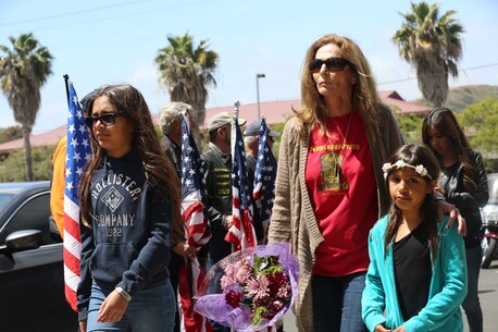 MARINE CORPS BASE CAMP PENDLETON, Calif. – Family and friends walk past the Patriot Guard Riders before entering the San Mateo Memorial Garden on Camp Pendleton April 29, 2016. The family and friends attended the 3rd Battalion, 5th Marine Regiment “Dark Horse” Reunion to honor the Marines who were deployed to Sangin, Afghanistan in the fall of 2010. (U.S. Marine Corps photo by Lance Cpl. Shellie Hall/Released)
