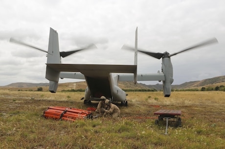 Marines with Marine Medium Tiltrotor Squadron (VMM) 165 prepare the Bambi bucket for the 2016 Wildland Firefighting Exercise aboard Marine Corps Base Camp Pendleton, Calif., May 5. The exercise was a multiaircraft operation with both ground and air units working together for maximum firefighting efforts. (U.S. Marine Corps photo by Lance Cpl. Harley Robinson/Released)