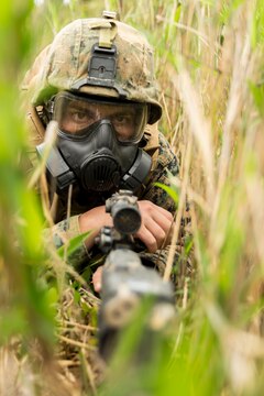 Lance Cpl. Coty Shuke, a combat engineer with Marine Wing Support Squadron 171, engineer company, combat engineer platoon, provides security during a simulated aircraft salvage and recovery operation as part of exercise Thunder Horse 16.2 at the Japan Ground Self-Defense Force’s Haramura Maneuver Area in Hiroshima, Japan, May 11, 2016. Motor transportation operators, combat engineers, heavy equipment operators and aircraft rescue and firefighters worked together to recover the simulated downed aircraft. The exercise focuses on reinforcing skills that Marines learned during Marine Combat Training and throughout their military occupational specialty schooling in order to maintain situational readiness. (U.S. Marine Corps photo by Lance Cpl. Aaron Henson/Released)