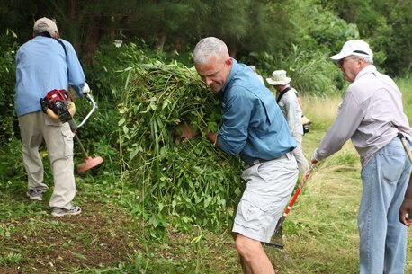 Camp Schwab SMP Marines and the Henoko senior citizen's association worked together to clean the beach in preparation for the Dragon Boat Race this Sunday. Camp Schwab commander Col. David L. Odom and SgtMaj. Mario P. Fields came to greet Marines and Henoko senior citizen to share their support of community relation activities on May 12, 2016.
