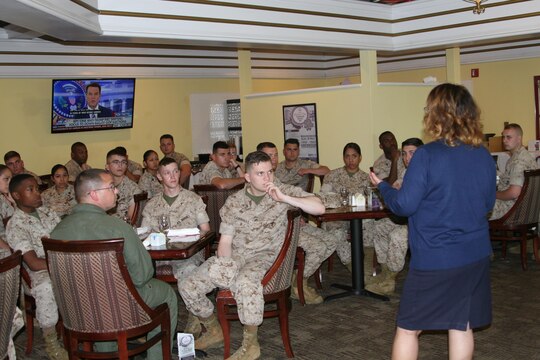 Marines listen to a speaker explain strategies and planning goals for transition from military-to-civilian life when service in the Marine Corps concludes. Such subjects include how to determine an appropriate post-military career to resume preparation and education opportunities available to members currently serving.