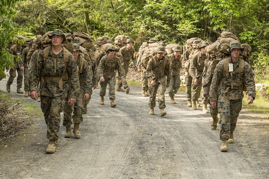 Marines with Marine Wing Support Squadron 171 participate in a hike during exercise Thunder Horse 16.2 at the Japan Ground Self-Defense Force’s Haramura Maneuver Area in Hiroshima, Japan, May 12, 2016. The week-long exercise focused on reinforcing skills that Marines learned throughout their military occupational specialty schooling and during Marine Combat Training in order to maintain situational readiness. Motor transportation operators, bulk fuels specialists, and field radio operators trained in various areas including direct refueling, recovery and general engineering operations and established a tactical motor pool. (U.S. Marine Corps photo by Lance Cpl. Aaron Henson/Released)