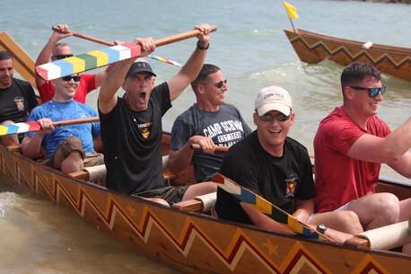 Col. David Odom, the commanding officer of Camp Schwab, participates in the Dragon Boat Races May 15 with his team. The races is a great way to experience the rich cultural history of Okinawa while having fun and making new friends.