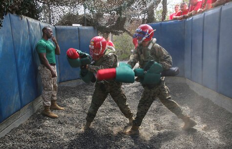 Recruits with Bravo Company, 1st Recruit Training Battalion, compete against each other during Pugil Sticks III at Marine Corps Recruit Depot San Diego, May 24. The match was won when a recruit delivered a blow to the head or multiple body strikes to their opponent. Annually, more than 17,000 males recruited from the Western Recruiting Region are trained at MCRD San Diego. Bravo Company is scheduled to graduate June 17.