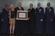 Dr. Joe Leverett receives the Tampa Bay Trophy during the 2016 Airlift Tanker Association convention in Nashville, Tennessee, Oct. 27, 2016. (U.S. Air Force photo by Senior Airman Megan Friedl) 