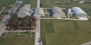 DAYTON, Ohio (11/2016) -- Aerial view of the National Museum of the U.S. Air Force. The museum collects, researches, conserves, interprets and presents the Air Force's history, heritage and traditions, as well as today's mission to fly, fight and win...in Air, Space and Cyberspace to a global audience through engaging exhibits, educational outreach, special programs, and the stewardship of the national historic collection. (U.S. Air Force photo by Ken LaRock, pilot Matt Kiefer)