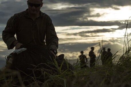 U.S. Marine Cpl. Shawn Stucker, from Billings, Mont., packs his gear after a low-level static line training exercise on Basa Air Base, Philippines, during Philippine Amphibious Landing Exercise 33 (PHIBLEX), Oct. 9, 2016. PHIBLEX is an annual U.S.-Philippine military bilateral exercise that combines amphibious capabilities and live-fire training with humanitarian civic assistance efforts to strengthen interoperability and working relationships. Stucker is a parachute rigger with Force Recon Platoon, 31st Marine Expeditionary Unit, III Marine Expeditionary Force. (U.S. Marine Corps photo by Lance Cpl. Nelson Duenas/Released) 