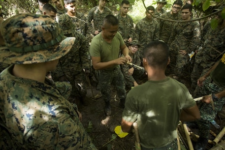 Subscribe 
76
  

Philippine Marine Staff Sgt. Bernaje G. Canindo, a reconnisance marine, demonstrates fire making to U.S. Marines assigned to Fox Company, Battalion Landing Team 2nd Battalion, 4th Marine Regiment, 31st Marine Expeditionary Unit, during a jungle survival class as part of Philippine Amphibious Landing Exercise 33 (PHIBLEX), at Marine Barracks Gregorio Lim, Ternate, Philippines, Oct. 6, 2016. PHIBLEX 33 is an annual bilateral exercise conducted with the Armed Forces of the Philippines that combines amphibious capabilities and live-fire training with humanitarian civic assistance efforts to strengthen interoperability and working relationships through commitment, capability and cooperation. (U.S. Marine Corps photo by Cpl. Darien J. Bjorndal/ Released)

